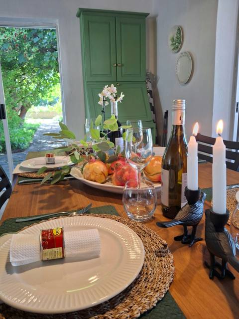 Dinner table set with candles